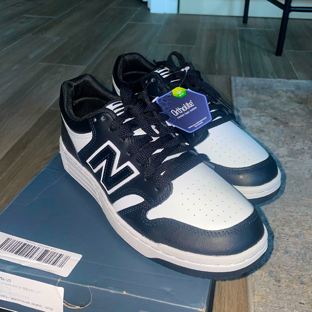 Brand new New Balance white and black sneakers